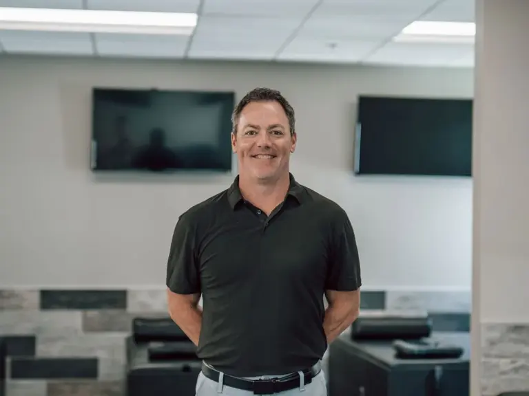 Dr. Mark Peery standing in the treatment room at Eastern Oklahoma Wellness Center in Tulsa
