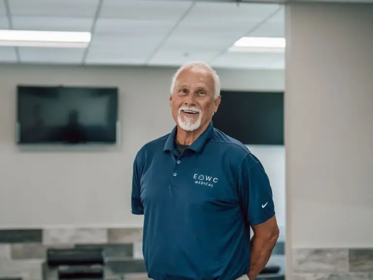 Rick Barnes, nurse practitioner, standing in the treatment room at Eastern Oklahoma Wellness Center in Tulsa